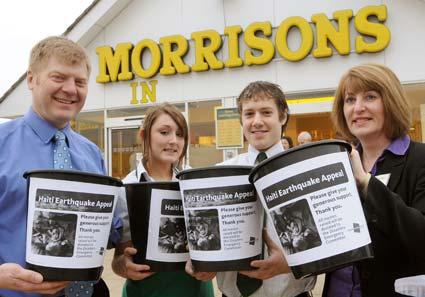 Morrison's staff collecting cash for Haiti earthquake victims. From left: manager David Charlton, Chelsea Scott, Johnny Wilson and Bev Cook.