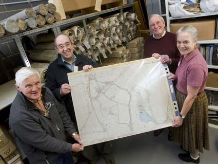 Volunteers have completed their painstaking work to repair and catalogue maps of North Yorkshire at the County Records Office.