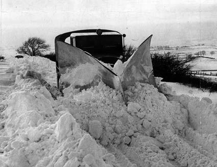 A snowplough gives the road from Gally Gap to Leavening a second  sweep in 1954 after another snowplough got stuck.