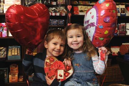 Children from House Martin's Day Nursery are pictured in Mennell's chocolate shop in Malton, where shopkeepers are decorating their windows with St Valentine's Day hearts and flowers to encourage people to shop in the town.