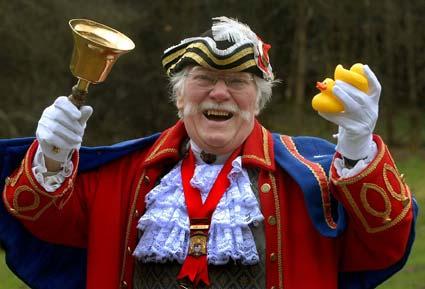 Scarborough town crier Alan Booth starts the annual duck dash in Dalby Forest.