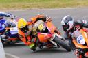 Sam Holme (No.10) in action at Mallory Park