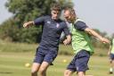 ON THE ATTACK: Wes York, pictured taking on Harry Thompson in pre-season training, is aiming to help fire York City back up the leagues. Picture: Ian Parker