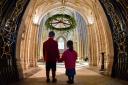 Children from the Minster School admire the rising of the Christmas wreath in York Minster, which has become an annual tradition