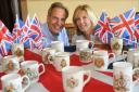 William and Marie Noelle Worsley with the collection of mugs at Hovingham Hall