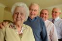 Rose Smith who celebrates her 100th birthday today pictured with her sons, from left, Des, 77, David, 66, and Michael, 73