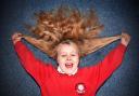 Bella Suggitt, from Pickering, before having her hair cut to raise money for the Little Princess Trust in January                                              Picture: Frank Dwyer