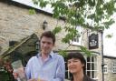 Anne Banks with her son, Tommy,     outside The Black Swan at Oldstead