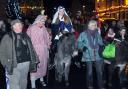Mary (Hannah Poole) riding a donkey through the streets of Malton during the town Nativity with Joseph (Richard Lukey) and the Rev Canon John Manchester, left, leading the procession to “Bethlehem”