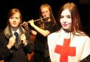Moweena Davies, Clementine Cooper and Jessica Heap in Ryedale School's  Clowns at Midnight