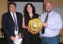 Charles Wrightson awards the Dennis Cobbold shield to Clare Finlinson, Malton & Norton safeguarding officer, and deputy safeguarding officer Ian Hepworth