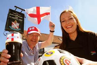 Eunice Walker (who is originally from South Africa) and Ian Walker, of the Wombwell Arms in Wass, prepare for the World Cup.     
 