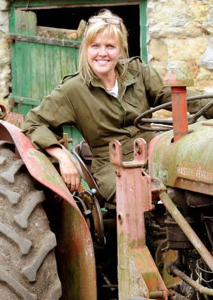 Actree Ashley Jensen gets to grip with a tractor while filming the BBC comedy, The Accidental Farmer, in Thornton-le-Dale, near Pickering.