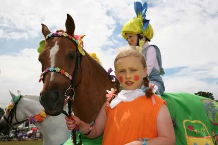 Entrants into the Fancy Dress Competition in the ring at Malton Show.