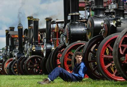 A young man takes a breather during a parade of engines at Pickering Traction Engine Rally.
