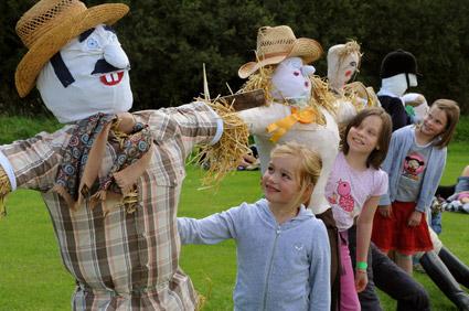 Looking at some of the scarecrows at Rosedale Show.