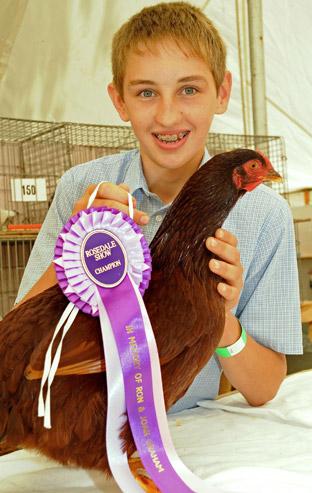 George Bulmer, of Salton, with his Rhode Island Red which won best in show.