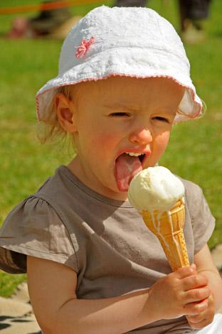 A young visitor enjoys an ice-cream at Rosedale Show.