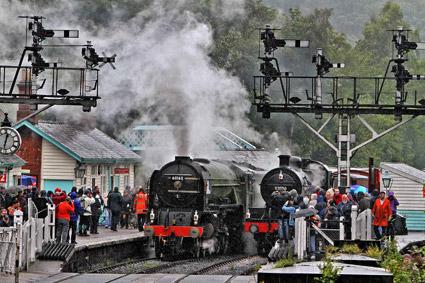 The scene at Grosmont Station as hundreds of people turn out for the first day of the North Yorkshire Moors Steam Gala Weekend despite torrential rain.