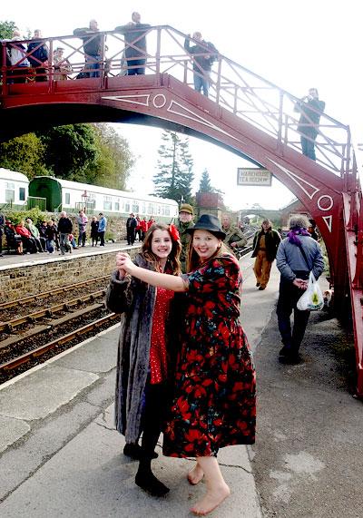 Katie Wallis, from Goathland, and Kathryn Pennington, from Kirby Gryndalythe, dance to live music on the platform at Goathland Station as part of the North Yorkshire Moors Railway In Wartime weekend.