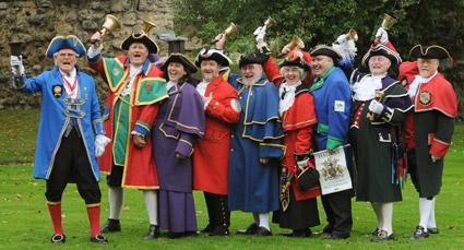 Competitors line up before the  Malton and Norton Town Crier Competition, which took place as part of Malton's first literature festival.