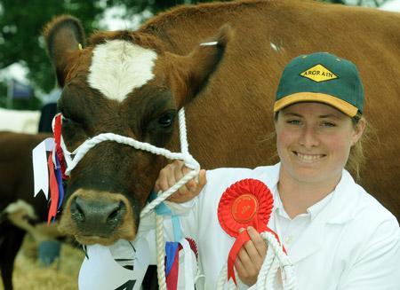 Roseanne Hitchman, from New Zealand, with Rosie, the champion Ayrshire