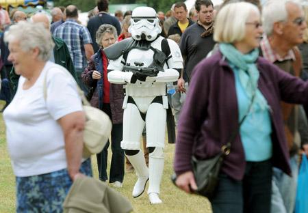 A Star Wars stormtrooper arrives at Ryedale Show, to help raise money for the Yorkshire Air Ambulance. 