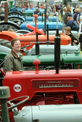 Tractor exhibitor Robert Bosworth admires the competition at Ryedale Show.