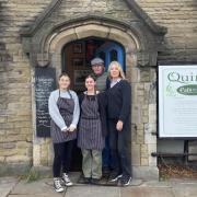 Richard and Shirley Potter with staff at Quirky Café and Bar