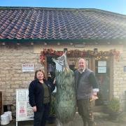 Samantha Smith and Stephen Wombwell with the Wath Court Christmas tree outside the children’s nursery in Hovingham.