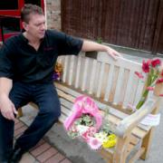 Darren Rushworth from the Derwent Arms, Norton, sitting on the memorial bench dedicated to the two young jockey’s that died two years ago in a fire across from the pub