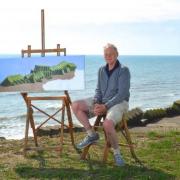 Artist Peter Watson painting his latest work