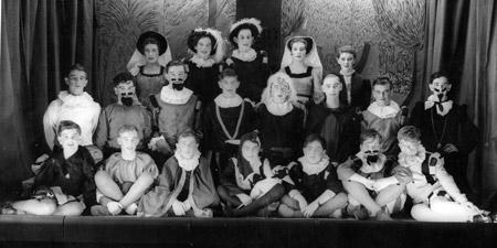 On stage during a production of Twelfth Night in 1954. 