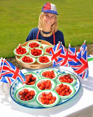 Isabella Worsley selling Strawberrys at Hovingham Hall during the Queens Diamond Jubilee celebrations at the house