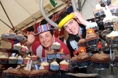 Sophie Legard and Andrew Walker look after the cakes at Malton and Norton jubilee party.