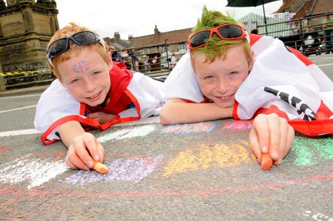 Helmsley  Market Place Jubilee Celebrations on Bank Holiday Tuesday  Twins (l-r), James and Harry King (8) enjoy the day