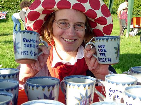 Potter Sophie Hamilton with her mugs which were given to youngsters in Marishes. 