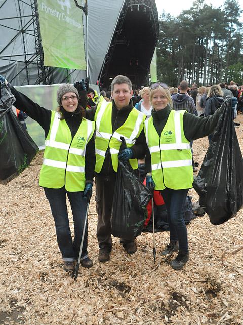Volunteer litter pickers Natalie, left, Pete and Sally at Dalby Forest, on Friday night