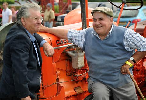 David Bulmer, right, with his 1941 Case VC tractor, chats to a friend