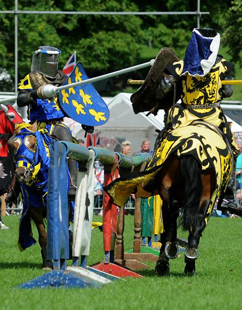 Sir Robert of Sheffield, in blue, and the Black Knight jousting as part of the Knights of Nottingham show
