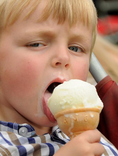 A youngster enjoys an ice cream at Thornton-le-Dale Show