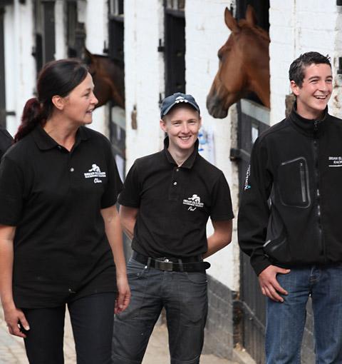 Brian Ellison's wife Claire chats to stable lads at the end of Malton Stables Open Day