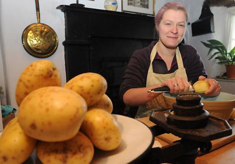 Emma McKenzie prepares the ingredients for one of the meals for Potato Day at Ryedale Folk Museum   