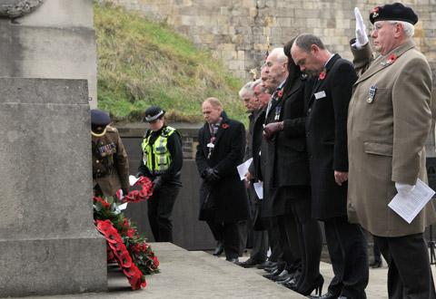 Wreath layers pay their respects at the Railway Cenotaph during the Remembrance Service. 