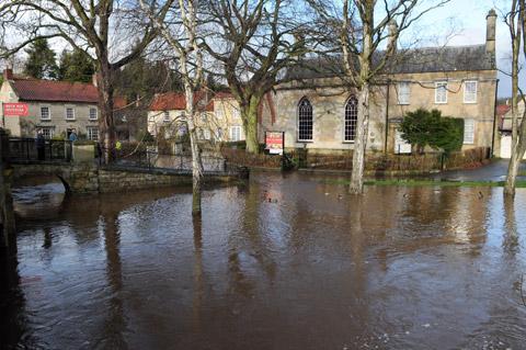 Beck Isle Museum in Pickering surrounded by floodwater