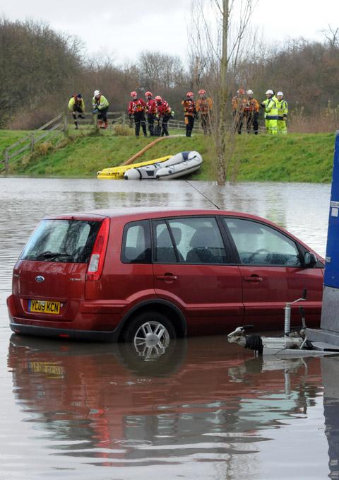 A stranded car in floodwater at Old Malton.