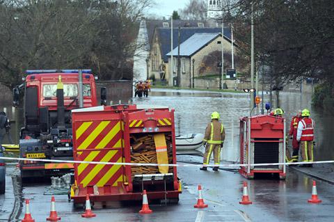 Emergency services in position at Old Malton which was closed off by floodwater. 