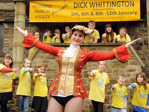 Michelle Carter as Dick with members of Pickering Youth Theatre as Pickering Musical Theatre rehearse for their pantomime, Dick Whittington.