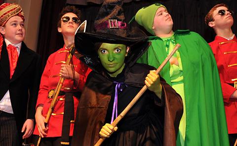  Wicked Witch Ria Williams casts a spell over Cameron Jackson, Harry Coutts, Jamie Davison and Barley Gillespie in Ryedale School's production of The Wizard Of Oz
