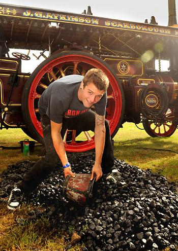 Ben Hall coals  the showman engine ' His Lordship' which is owned by Graham Atkinson and is part of the Scarborough Fair Collection 